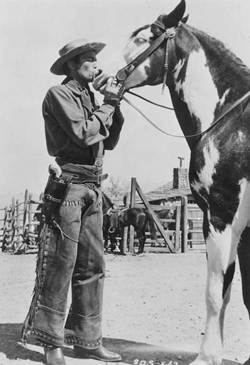 gregory-peck-kissing-a-horse.jpg
